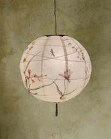Sip & Paint: Paper Lanterns, a beautifully crafted paper lantern with floral designs.