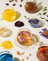 Ultimate Wellness Set featuring floral teas and vibrant flowers for a relaxing experience.