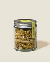 Wild Chrysanthemum tea jar showcasing single origin herbal beauty and natural wellness.