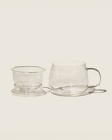 Dewdrop Cup featuring a removable strainer and lid, perfect for enjoying blooming teas and loose leaf teas.