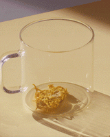 Royal Chrysanthemum flower displayed in a clear tea cup, ready for brewing a soothing herbal tea.