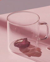 Shangri-la Rose Flower being infused with hot water in our glass server
