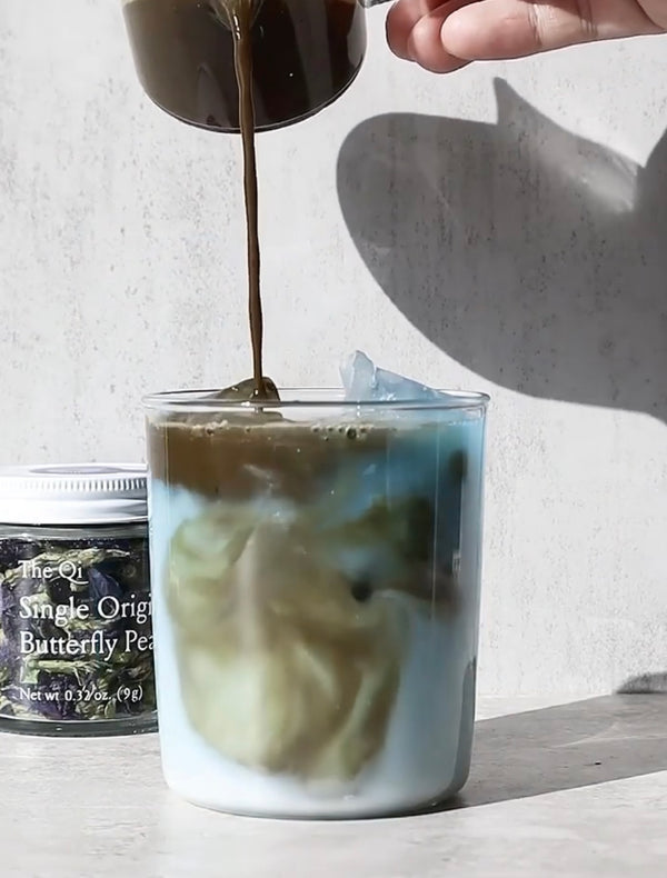 The Qi Organic Butterfly Pea Flower Tea Latte with a Twist