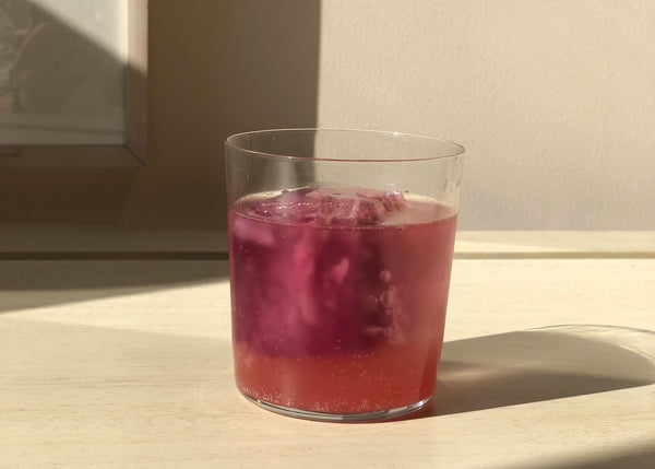 sparkling water with watermelon juice and rose ice