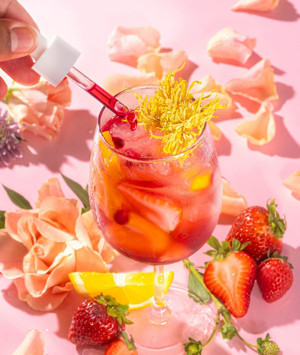 The Power of 13 Super Healing Flowers and Their Uses - colorful drink with fruits and flowers, vibrant presentation