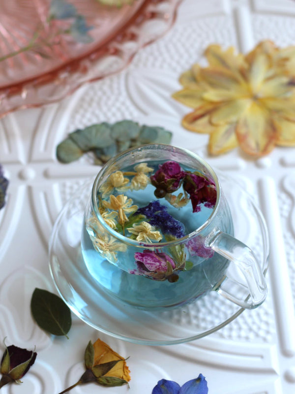 the qi recipe for confetti flower tea with rosebuds jasmine butterfly pea flower teas