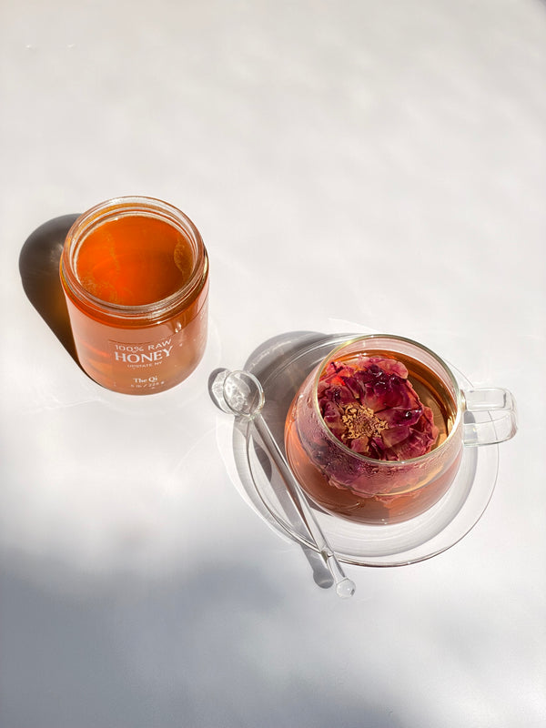 Organic Flower Tea and Honey in Glass Cup