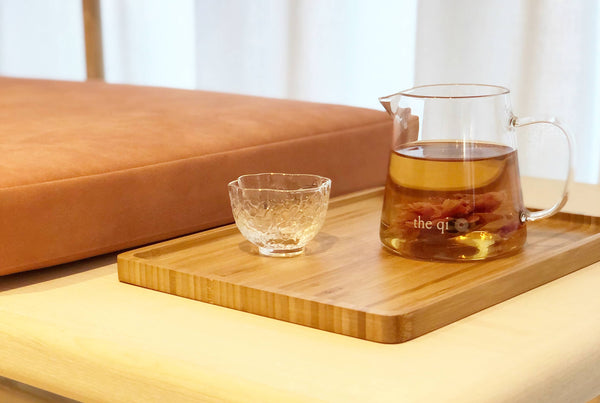 tea tray, glass teacup, and glass server are just a few of the kitchen must haves for tea lovers