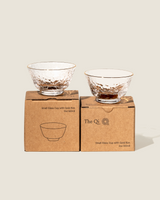 Gold rim glass cups (2) displayed on a the matching craft boxes they come packaged in
