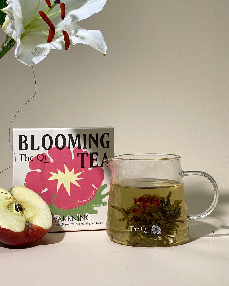 Shark Tank Special! Blooming tea set featuring glass teapot and flower tea on display.