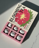 Shark Tank Special! Blooming Tea box with flower tea pods inside, promoting relaxation and wellness.