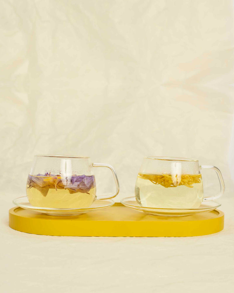 Glass cups & saucers (2)